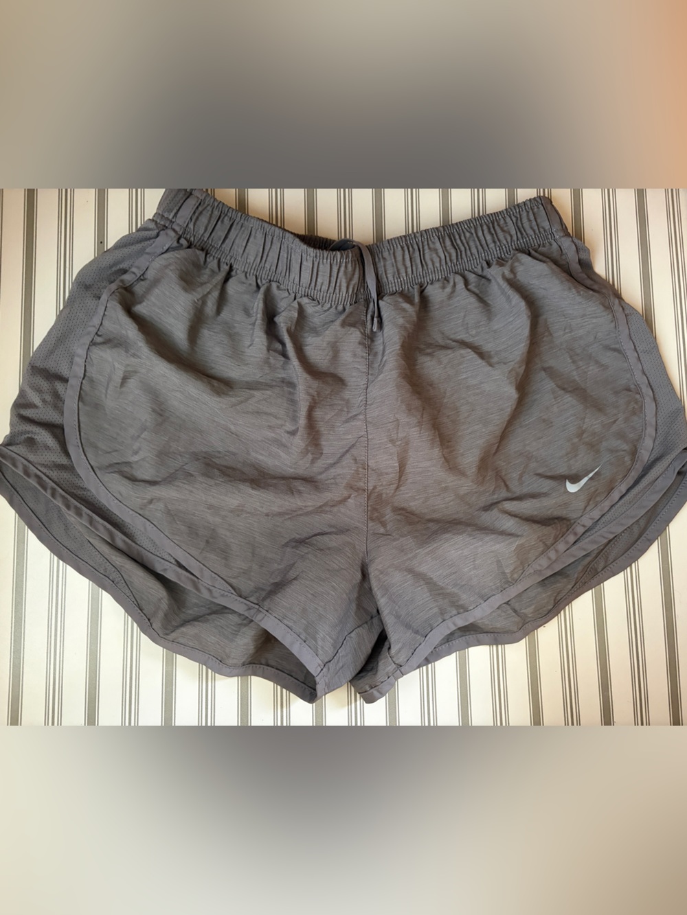 Nike Gray Athletic Shorts with White Swoosh